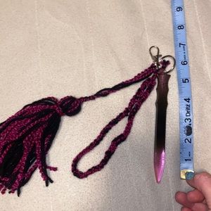 Pink and black resin self-defense keychain